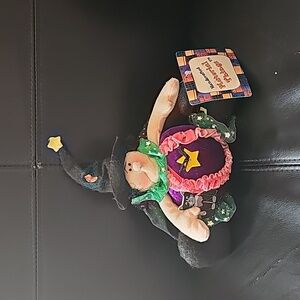 Hand crafted vintage kitchen witch with tags.